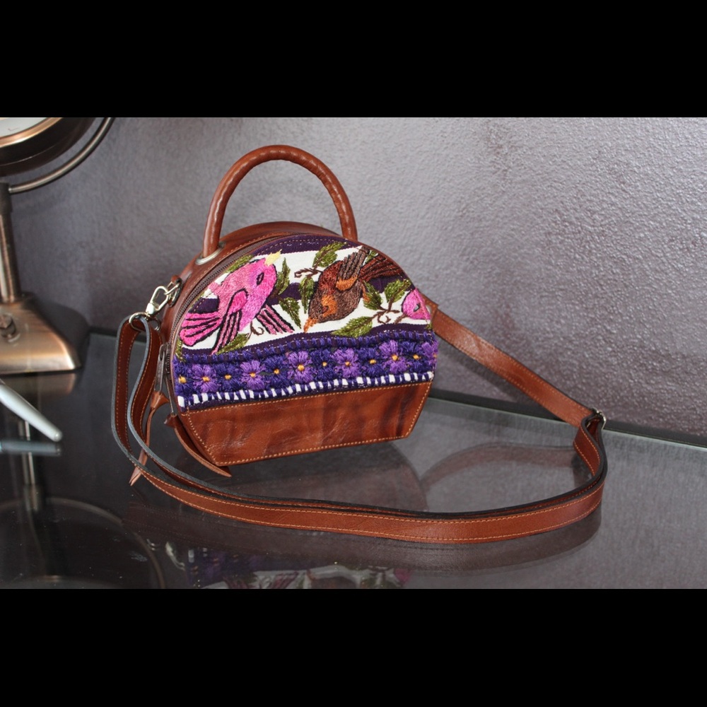 Round leather purse with embroidered birds